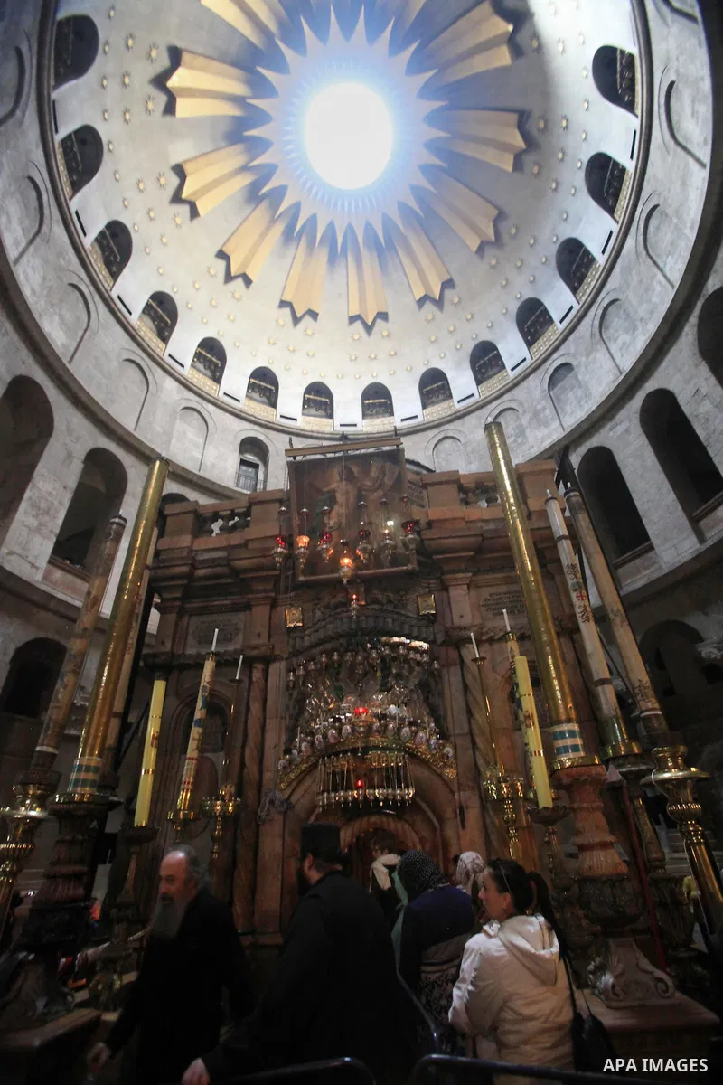 Palestinian Christians and pilgrims pray at the Church of the Holy Sepulchre Celebration the coming of Christmas in Jerusalem's old city on Dec. 08, 2015. The Church of the Holy Sepulchre is one of the most Holy sites in...