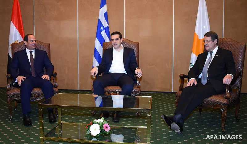Egyptian President Abdel Fattah al-Sisi, Greek Prime Minister Alexis Tsipras and Cypriot President Nicos Anastasiades pose prior to a meeting in Athens, on December 9, 2015. Photo by Egyptian President Office