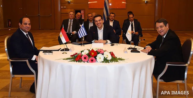 Egyptian President Abdel Fattah al-Sisi, Greek Prime Minister Alexis Tsipras and Cypriot President Nicos Anastasiades pose prior to a meeting in Athens, on December 9, 2015. Photo by Egyptian President Office