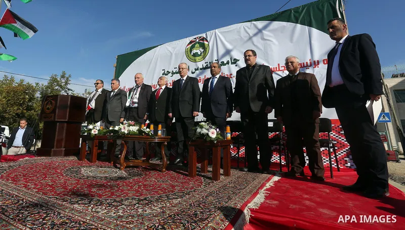 Palestinian Prime Minister Rami Hamdallah, takes part in a ceremony to place corner stone for Al-Quds Open University in the West Bank town of Salfit, southern Nablus on Dec. 10, 2015. Photo by Prime Minister Office