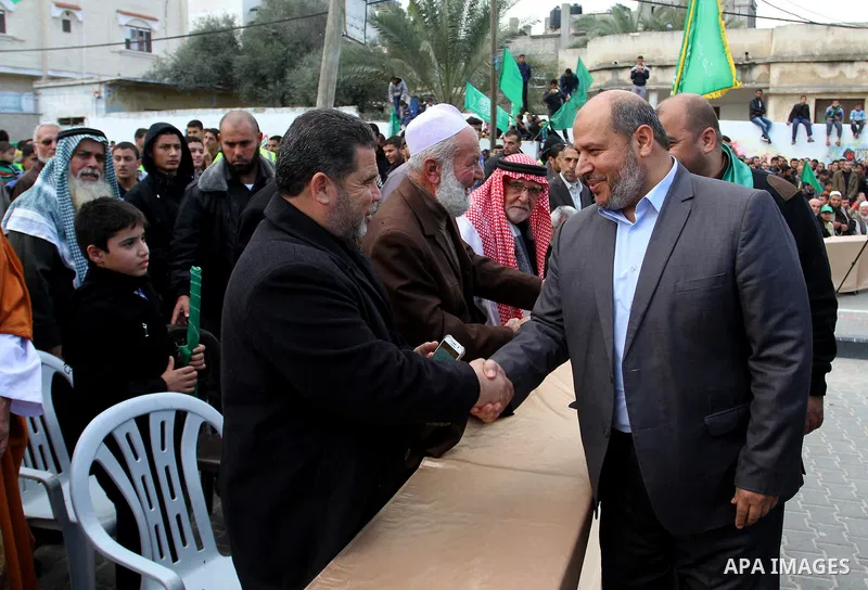 Senior Hamas leader Khalil al-Hayah attends a military parade by members of the Ezzedine al-Qassam Brigades, the armed wing of the Hamas movement, on December 11, 2015, to mark the ruling Islamist movement's 28th birthda...