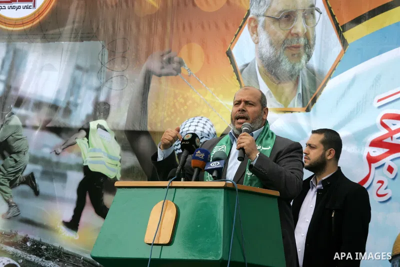 Senior Hamas leader Khalil al-Hayah speaks during a military parade by members of the Ezzedine al-Qassam Brigades, the armed wing of the Hamas movement, on December 11, 2015, to mark the ruling Islamist movement's 28th b...