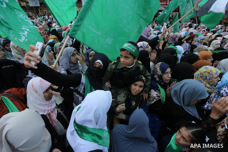 Palestinians take part in a rally marking the 28th anniversary of Hamas' founding, in Gaza City December 14, 2015. Photo by Mohammed Asad