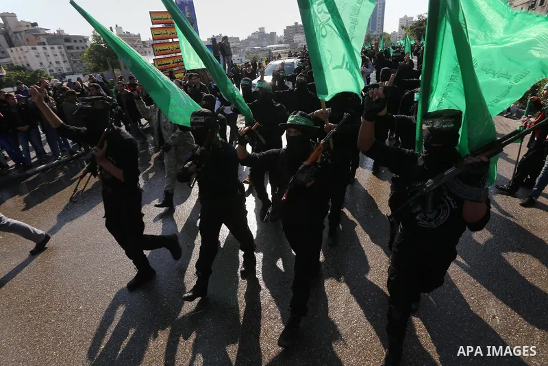 Palestinians take part in a rally marking the 28th anniversary of Hamas' founding, in Gaza City December 14, 2015. Photo by Mohammed Asad
