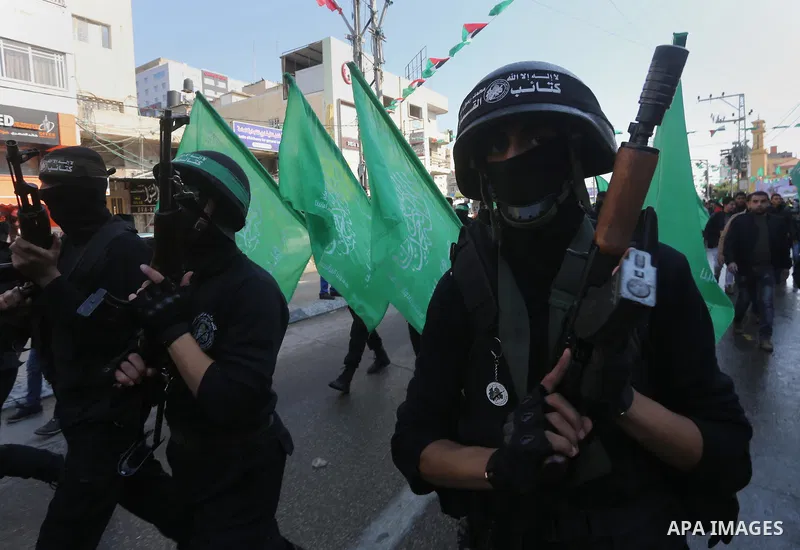 Palestinians take part in a rally marking the 28th anniversary of Hamas' founding, in Gaza City December 14, 2015. Photo by Mohammed Asad