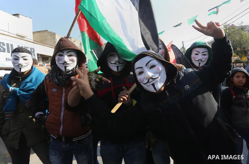 Palestinians take part in a rally marking the 28th anniversary of Hamas' founding, in Gaza City December 14, 2015. Photo by Mohammed Asad