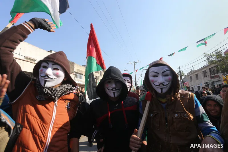 Palestinians take part in a rally marking the 28th anniversary of Hamas' founding, in Gaza City December 14, 2015. Photo by Mohammed Asad