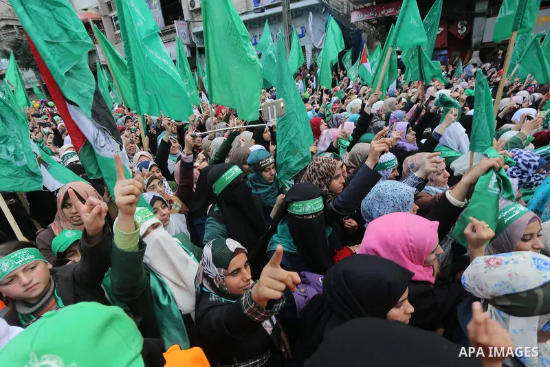 Palestinians take part in a rally marking the 28th anniversary of Hamas' founding, in Gaza City December 14, 2015. Photo by Mohammed Asad