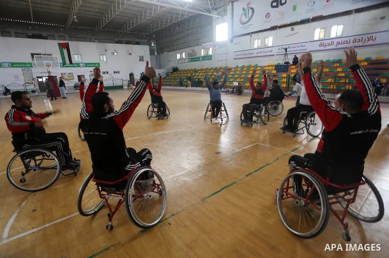 Disabled Palestinians take part in a local wheelchair basketball championship sponsored by the International Committee of the Red Cross (ICRC) in Gaza City December 17, 2015. Photo by Mohammed Asad