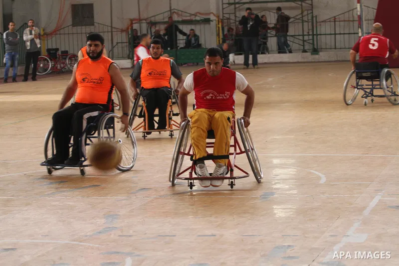 Disabled Palestinians take part in a local wheelchair basketball championship sponsored by the International Committee of the Red Cross (ICRC) in Gaza City December 17, 2015. Photo by Mohammed Asad