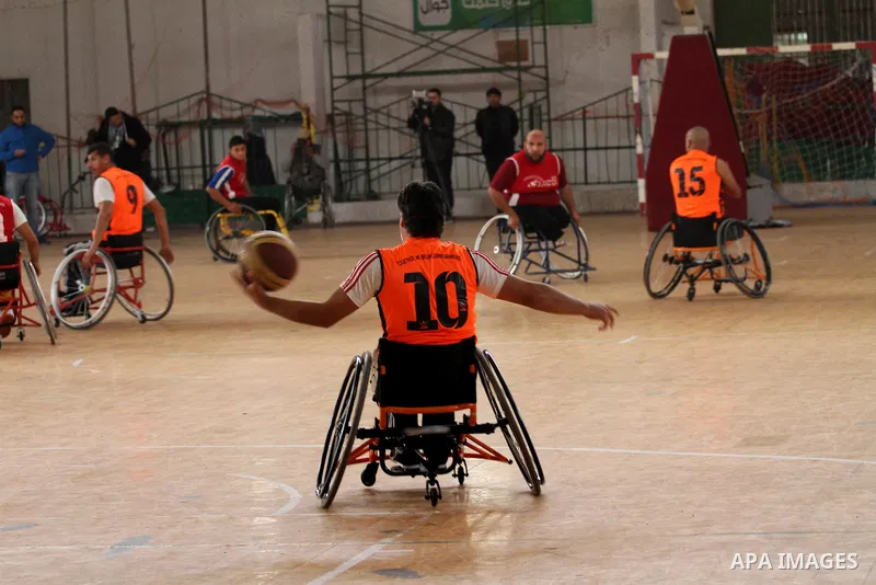 Disabled Palestinians take part in a local wheelchair basketball championship sponsored by the International Committee of the Red Cross (ICRC) in Gaza City December 17, 2015. Photo by Mohammed Asad
