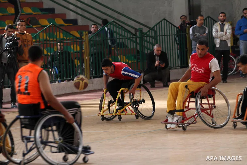 Disabled Palestinians take part in a local wheelchair basketball championship sponsored by the International Committee of the Red Cross (ICRC) in Gaza City December 17, 2015. Photo by Mohammed Asad