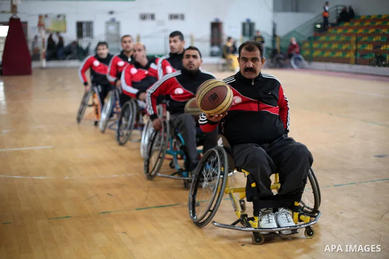 Disabled Palestinians take part in a local wheelchair basketball championship sponsored by the International Committee of the Red Cross (ICRC) in Gaza City December 17, 2015. Photo by Mohammed Asad