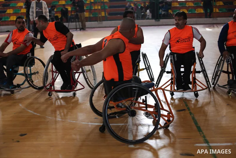Disabled Palestinians take part in a local wheelchair basketball championship sponsored by the International Committee of the Red Cross (ICRC) in Gaza City December 17, 2015. Photo by Mohammed Asad