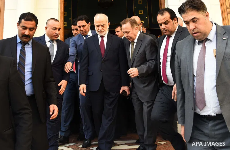 Iraq's Foreign Minister Ibrahim al-Jaafari leaves following attended emergency meeting of the Arab League foreign ministers in the Egyptian capital Cairo, on December 24, 2015. Photo by Stranger