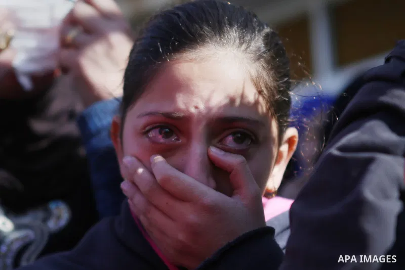 Palestinian relatives mourn during the funeral of Mahdiyah Hammad, a 38-year-old woman, who was shot dead by Israeli border guards after she tried to ram them with a car the day before, in the occupied West Bank village...