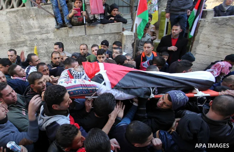 Mourners carry the body of Palestinian Baseem Salah, 38-year-old during his funeral in the West Bank city of Nablus on Dec. 30, 2015. Salah was killed Nov. 30 after an attack left an Israeli police officer wounded in Jer...