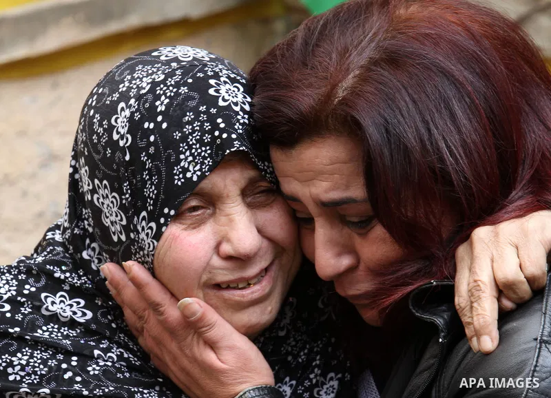 Relatives of Palestinian Baseem Salah, 38-year-old mourn during his funeral in the West Bank city of Nablus on Dec. 30, 2015. Salah was killed Nov. 30 after an attack left an Israeli police officer wounded in Jerusalem's...