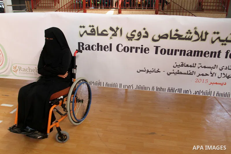 Disabled Palestinians play table tennis during the second Rachel Corrie Championship in Khan Younis in the southern Gaza strip on Dec. 30, 2015. Corrie, an American activist for the International Solidarity Movement (ISM...
