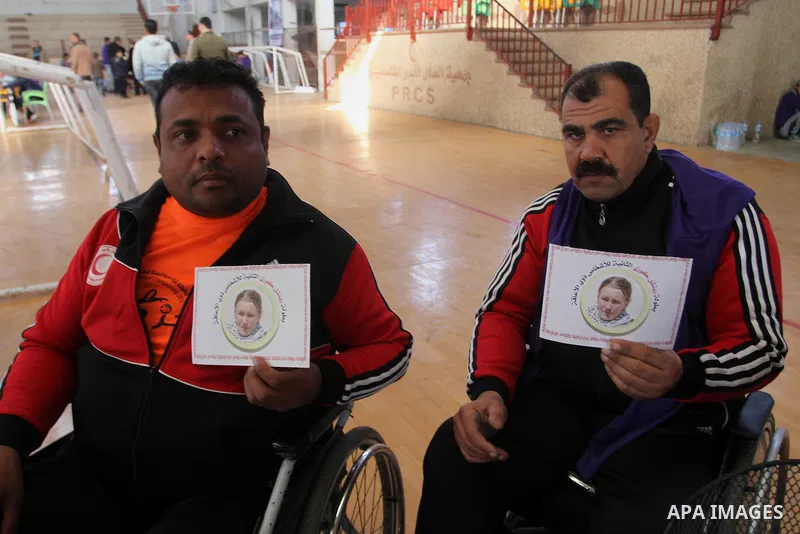 Disabled Palestinians play table tennis during the second Rachel Corrie Championship in Khan Younis in the southern Gaza strip on Dec. 30, 2015. Corrie, an American activist for the International Solidarity Movement (ISM...