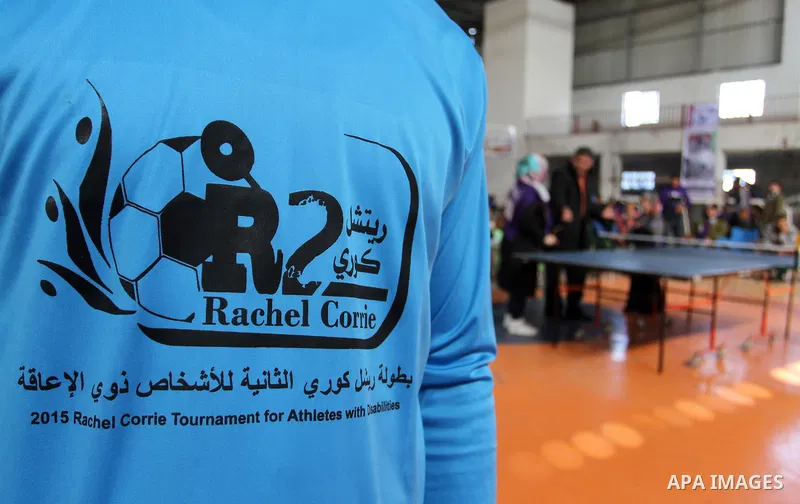 Disabled Palestinians play table tennis during the second Rachel Corrie Championship in Khan Younis in the southern Gaza strip on Dec. 30, 2015. Corrie, an American activist for the International Solidarity Movement (ISM...