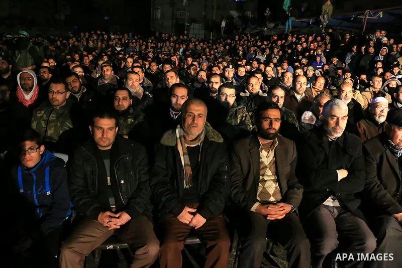 Palestinians participate in a memorial service for Abdul Rahman al-Mubasher in Khan Younis in the southern of Gaza strip on Dec. 30, 2015. Photo by Stranger