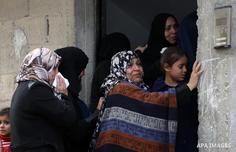 Relatives mourn during the funeral of Ishaq Hassan, 28, who was shot dead by Egyptian border guards as he crossed from the Gaza Strip into Egypt, on December 31, 2015 in Gaza city. Ishaq Hassan, who was said to suffer fr...