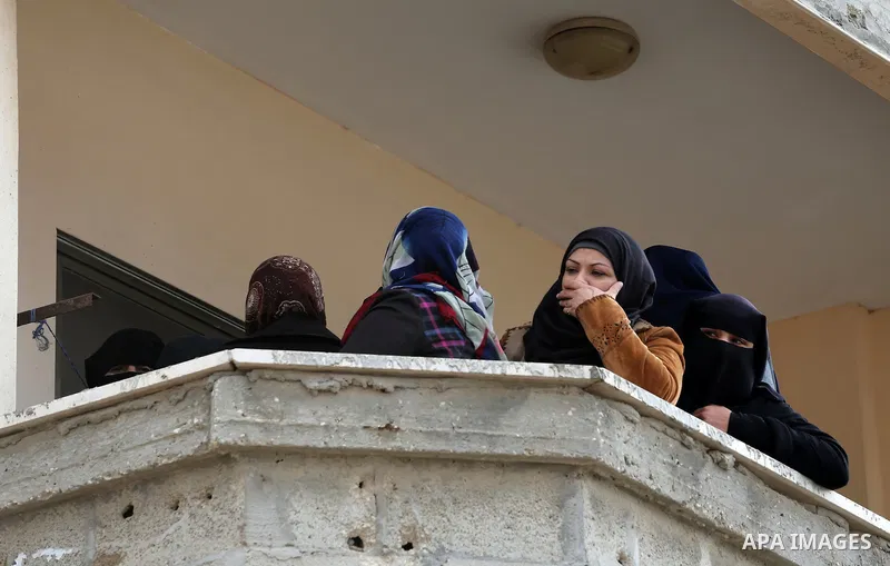 Relatives mourn during the funeral of Ishaq Hassan, 28, who was shot dead by Egyptian border guards as he crossed from the Gaza Strip into Egypt, on December 31, 2015 in Gaza city. Ishaq Hassan, who was said to suffer fr...