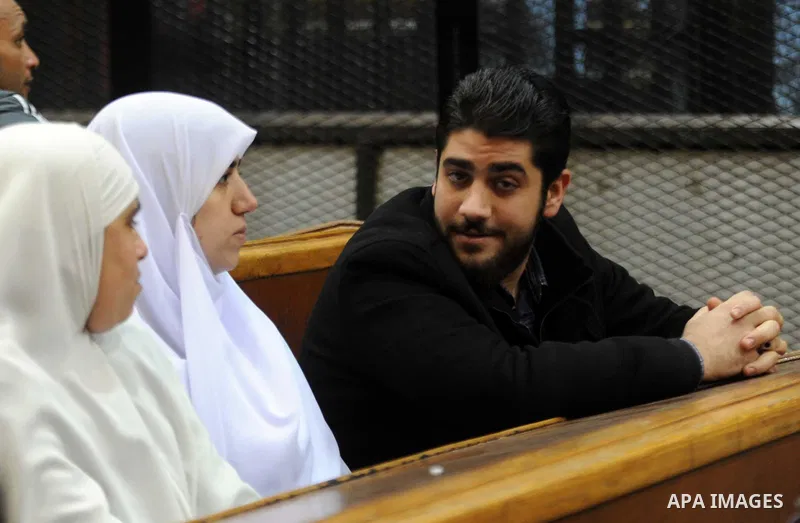 Relatives of Ousted Egyptian president Mohammed Morsi attend his trail as part of the so-called 'Qatar espionage' case, in a court in Cairo on january 2, 2015. The defendants are accused of 'leaking important national se...