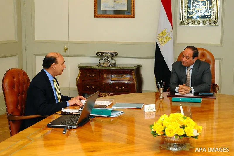 Egyptian President Abdel Fattah al-Sisi meets with Head of Suez Canal Authority Mohab Mamish in Cairo on january 2, 2015. Photo by Egyptian President Office