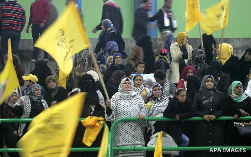 Palestinian Fatah supporters celebrate during a rally as they mark the 51st anniversary of the founding of the Fatah movement, in Rafah in the southern of Gaza strip Jan. 03, 2016. Photo by Abed Rahim Khatib