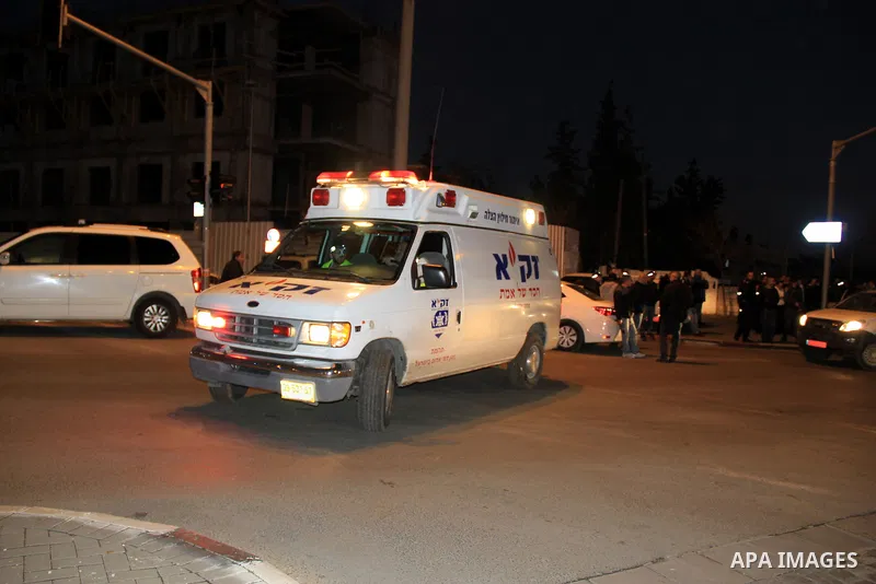 Israeli forensic police investigate the site of an attack near Jerusalem's light rail train service on January 4, 2016, after a Palestinian tried to stab security forces, police said. A 15-year-old Israeli girl was light...