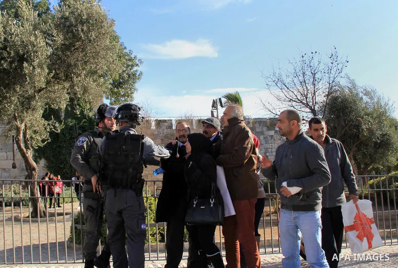 Israeli anti-riot policemen disperse Palestinian protesters at Damascus Gate in Jerusalem's Old City on January 5, 2016, as they demonstrate calling for the Israeli authorities to the return to their families the bodies...