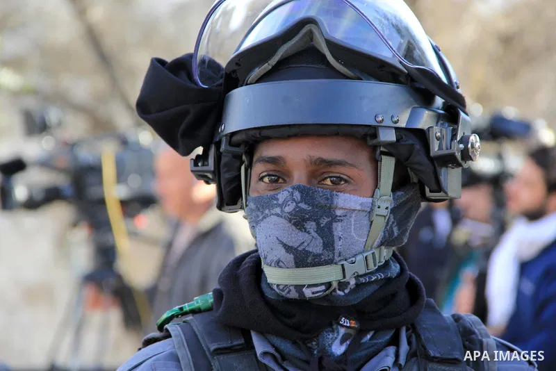 Israeli anti-riot policemen take position during a protest calling for the Israeli authorities to the return to their families the bodies of Palestinian attackers from East Jerusalem who were killed by Israeli security f...