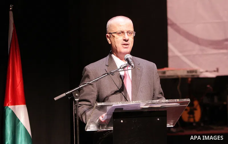 Palestinian Prime Minister, Rami Hamdallah, takes part in the celebration on the day of the Palestinian martyr, in the West bank city of Ramallah, on January 6, 2016. Photo by Prime Minister Office