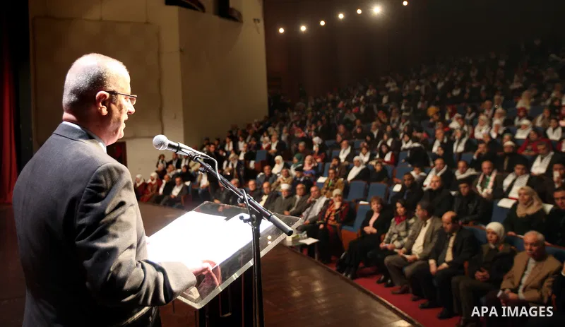 Palestinian Prime Minister, Rami Hamdallah, takes part in the celebration on the day of the Palestinian martyr, in the West bank city of Ramallah, on January 6, 2016. Photo by Prime Minister Office