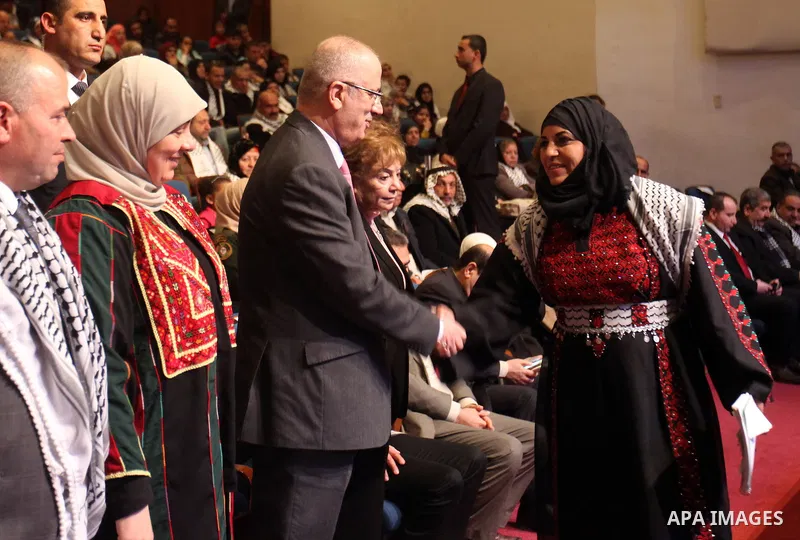 Palestinian Prime Minister, Rami Hamdallah, takes part in the celebration on the day of the Palestinian martyr, in the West bank city of Ramallah, on January 6, 2016. Photo by Prime Minister Office