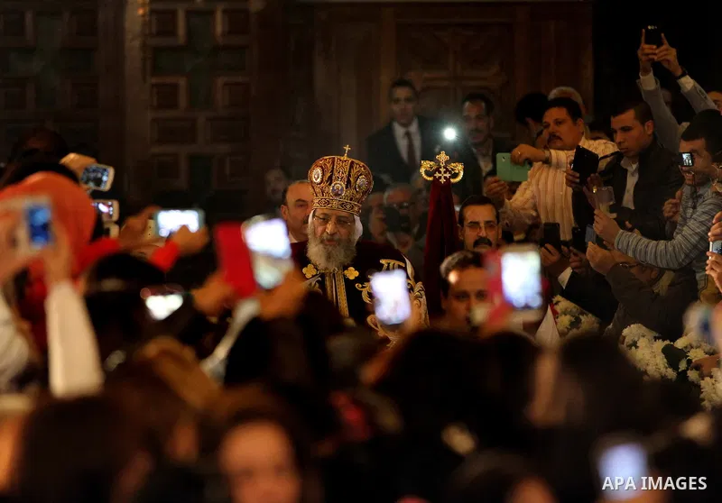 Pope Tawadros II, the 118th Pope of the Coptic Orthodox Church of Alexandria and Patriarch of the See of St. Mark Cathedral, leads Egypt's Coptic Christmas eve mass in Cairo, Egypt, January 6, 2016. Photo by Stringer