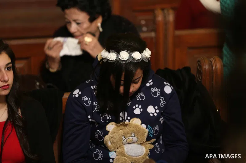 Egyptian Christians take part in the Coptic Orthodox Christmas Eve mass in St. Mark church in Cairo on January 6, 2016. Photo by Stringer