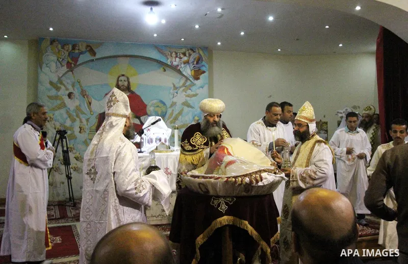 Egyptian Christians take part in the Coptic Orthodox Christmas Eve mass in Deir Simon Church in Cairo on January 6, 2016. Photo by Stringer
