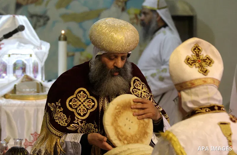 Egyptian Christians take part in the Coptic Orthodox Christmas Eve mass in Deir Simon Church in Cairo on January 6, 2016. Photo by Stringer
