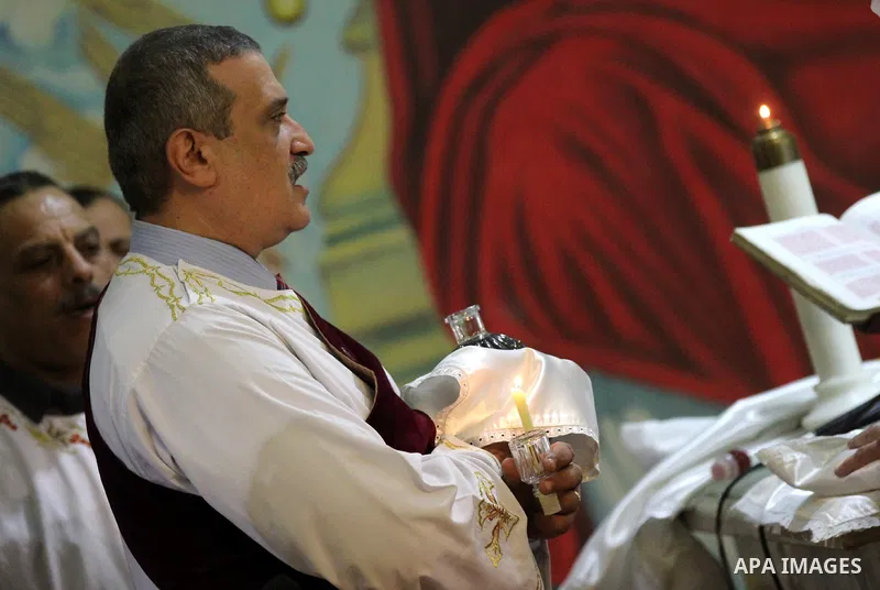 Egyptian Christians take part in the Coptic Orthodox Christmas Eve mass in Deir Simon Church in Cairo on January 6, 2016. Photo by Stringer