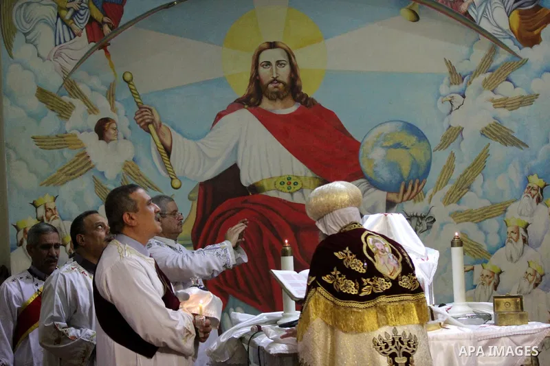 Egyptian Christians take part in the Coptic Orthodox Christmas Eve mass in Deir Simon Church in Cairo on January 6, 2016. Photo by Stringer
