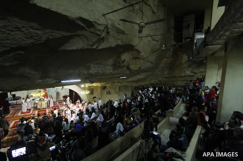 Egyptian Christians take part in the Coptic Orthodox Christmas Eve mass in Deir Simon Church in Cairo on January 6, 2016. Photo by Stringer