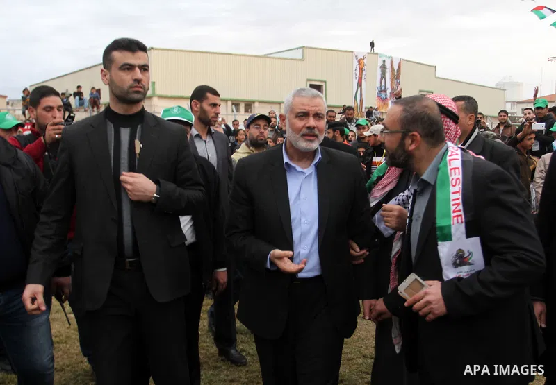 Senior Hamas leader Ismail Haniyeh attends a rally in Khan Yunis in the southern Gaza Strip on January 7, 2016. The rally was held to honor the families of dead militants from the armed wing, who Hamas said participated...