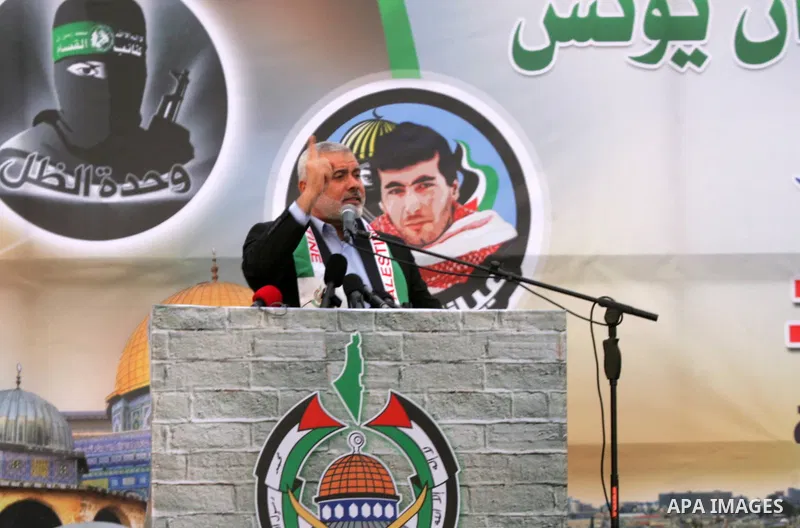 Senior Hamas leader Ismail Haniyeh speaks during a rally in Khan Yunis in the southern Gaza Strip on January 7, 2016. The rally was held to honor the families of dead militants from the armed wing, who Hamas said partici...