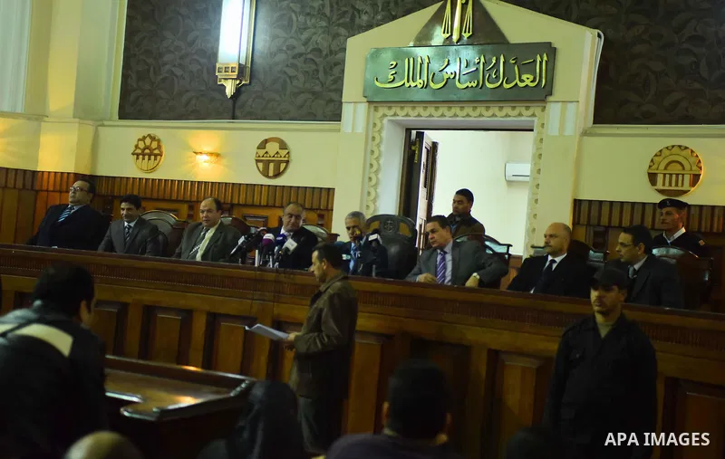 Egyptian Judges attend the trial of ousted Egyptian president Hosni Mubarak and his two sons Alaa and Gamal, inside the courtroom in Cairo on January 9, 2016, after top appeals court upheld upheld a three-year prison sen...