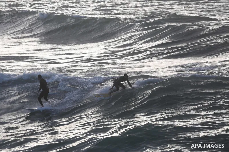 Palestinian youth enjoy water skiing in the Mediterranean Sea in Gaza City on January 10, 2016. Photo by Mohammed Asad