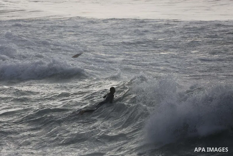 Palestinian youth enjoy water skiing in the Mediterranean Sea in Gaza City on January 10, 2016. Photo by Mohammed Asad