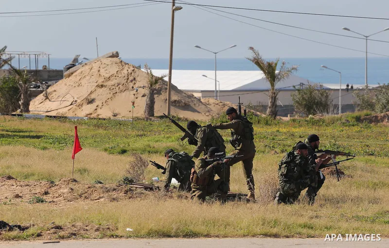 Members of Palestinian security forces loyal to Hamas demonstrate their skills during a military graduation ceremony in Gaza City January 10, 2016. Photo by Mohammed Asad